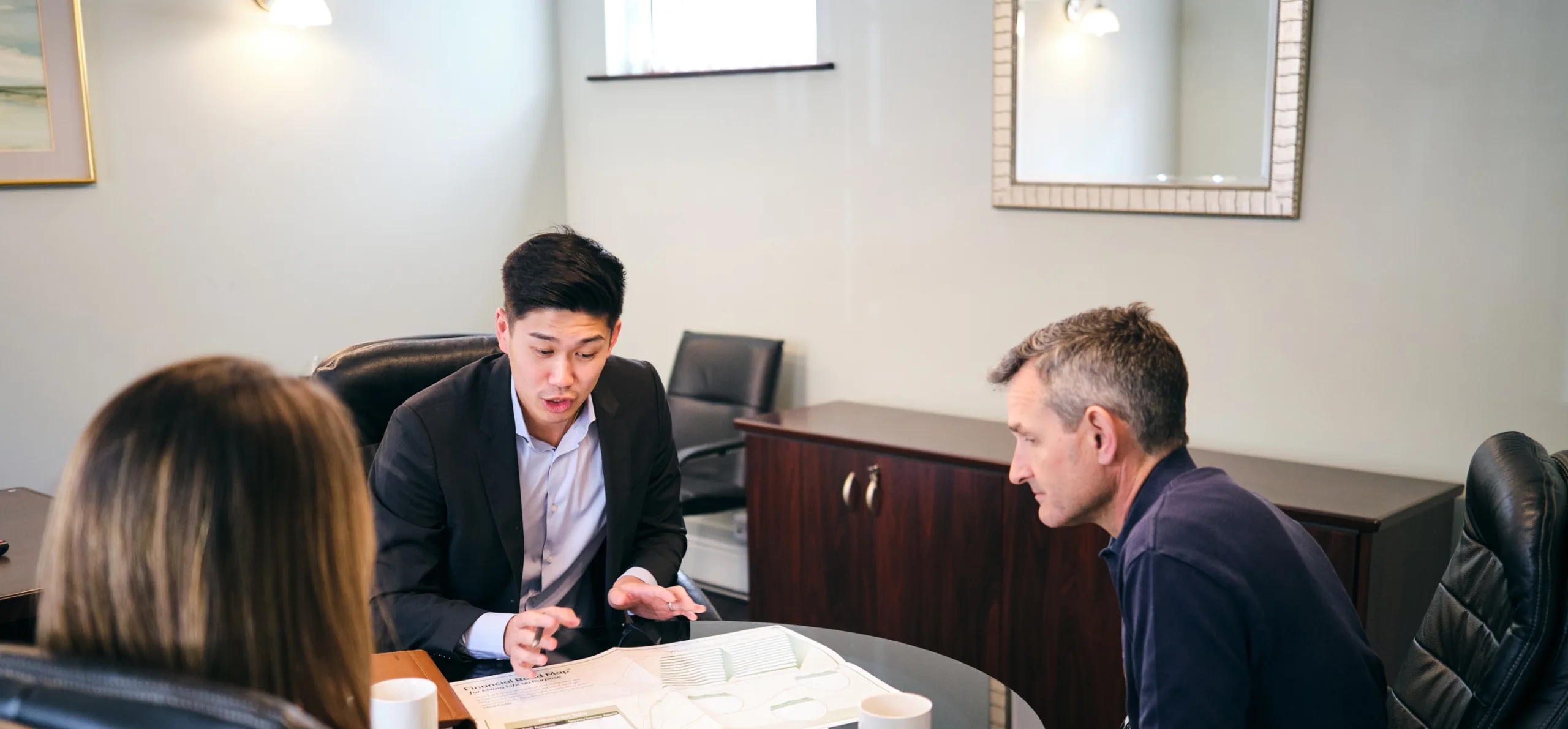 Financial Planner Jordan Wong hosts a financial planning meeting at our offices in Rectory Place, Loughborough, Leicestershire, East Midlands
