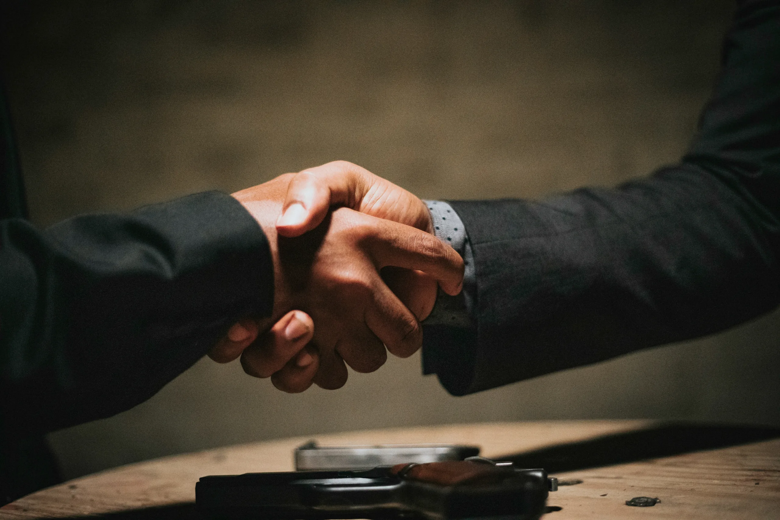 Decorative image of a handshake. To accompany blog on financial planning after selling a business